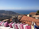 Restaurant on the roof of the world, Corsica (outdoor_seating=roof)